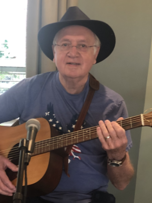 Bill Sidenstick playing guitar